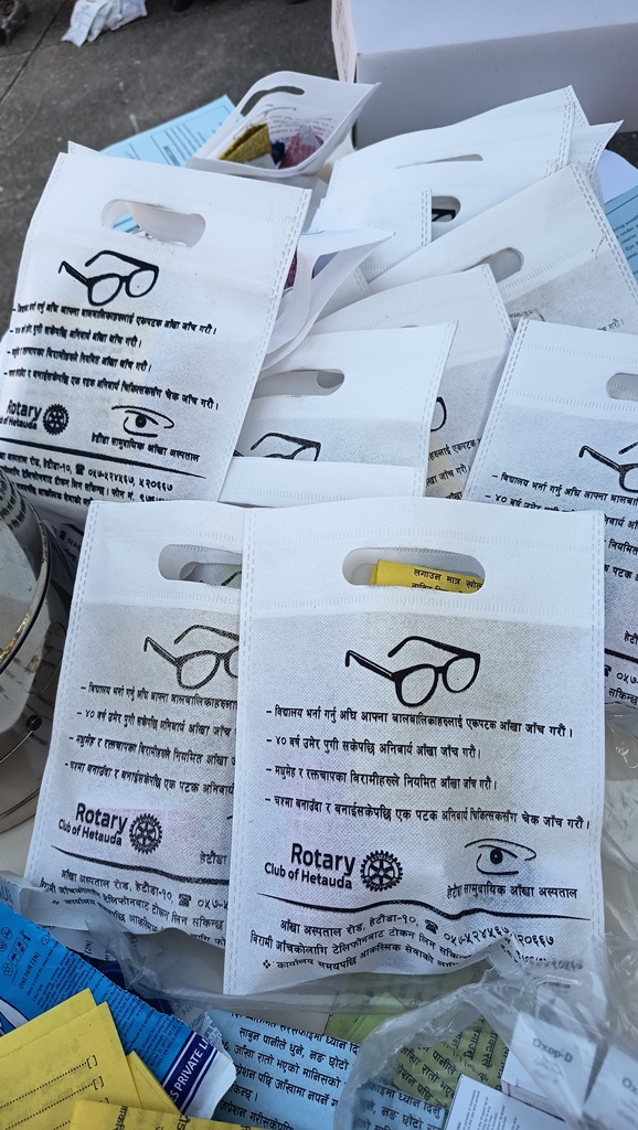 Rotary logo bags distributed to patients undergoing eye treatment