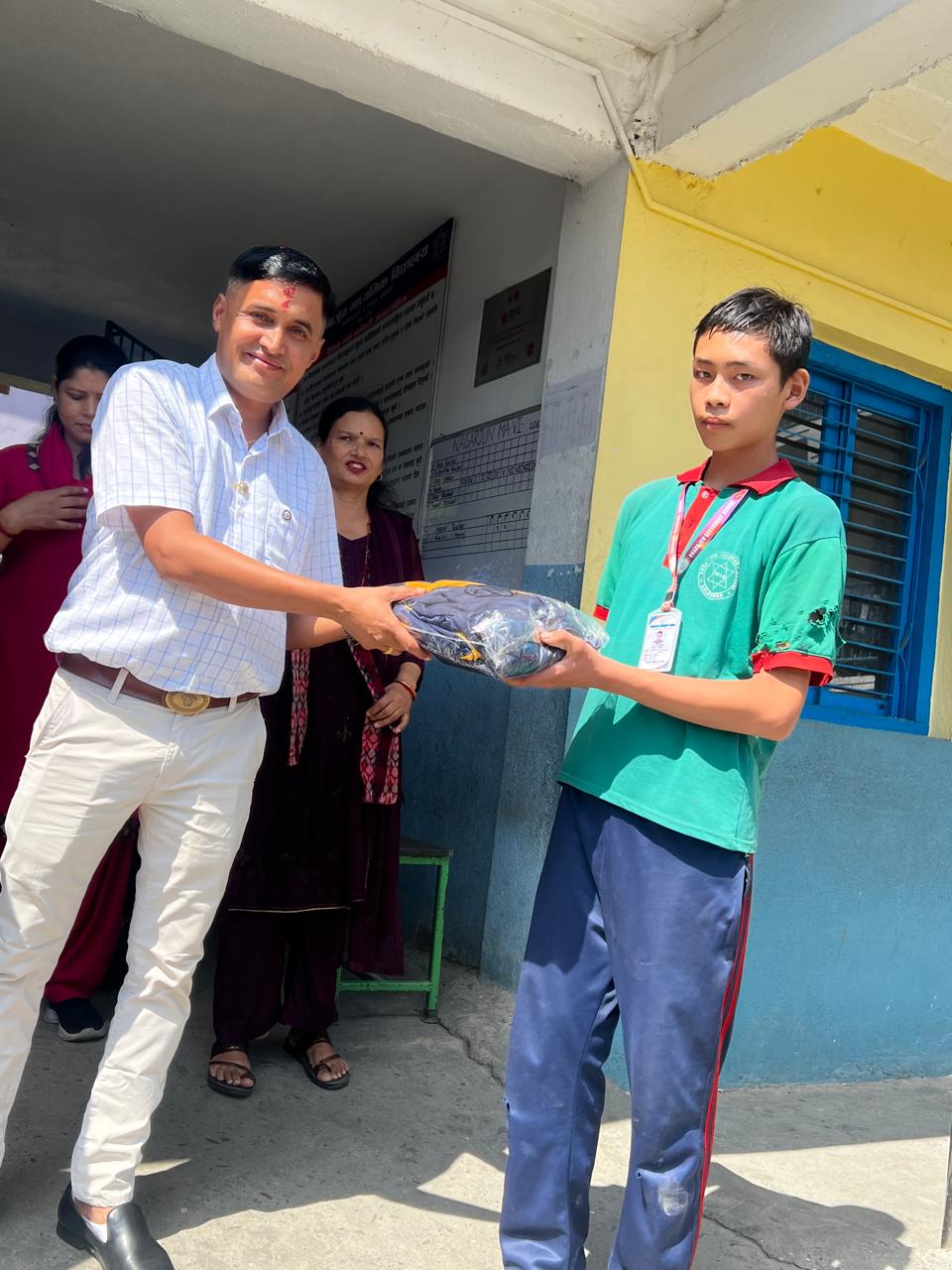 distribution of school uniform and warm clothes